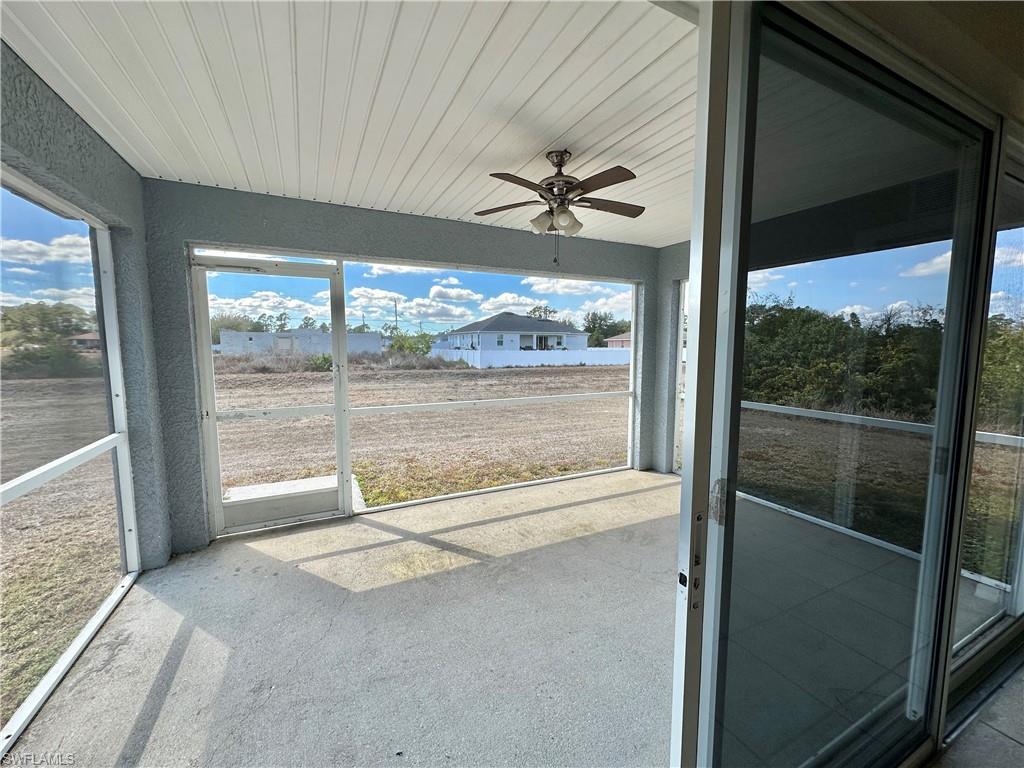 View through one open slider to Screened Lanai