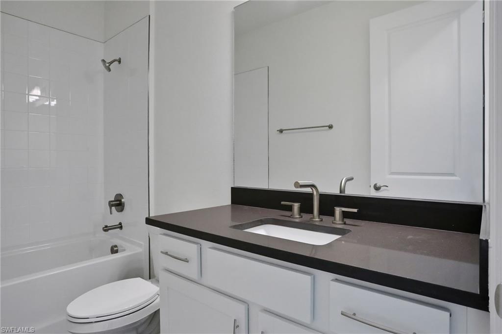 Full bathroom with  shower combination and vanity