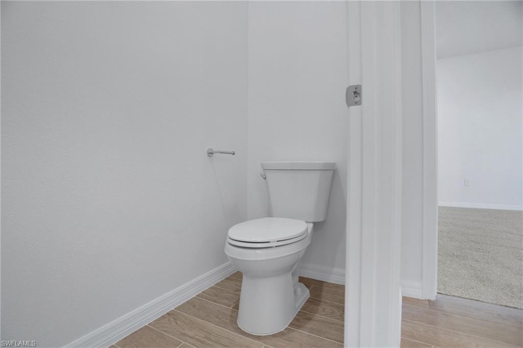 Bathroom featuring wood tiled floors