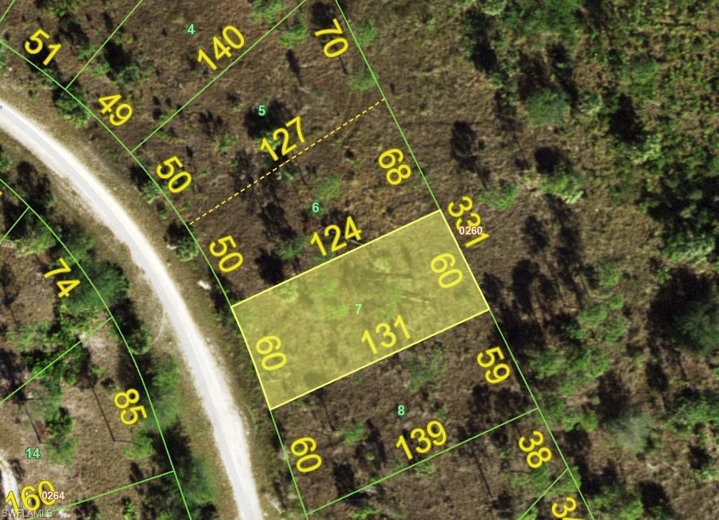 Aerial overview of property's location featuring property boundaries highlighted