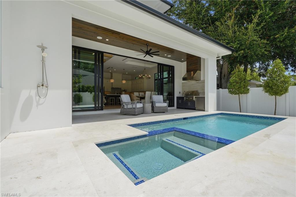 Pool and large pool deckwith outdoor shower