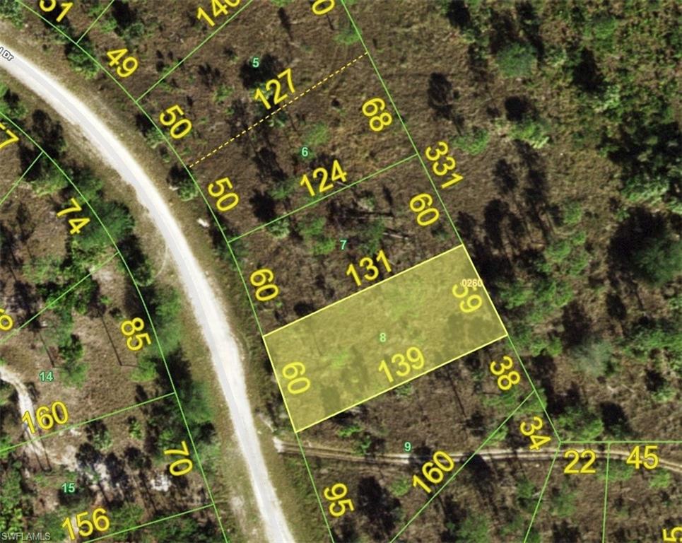Aerial view of property's location featuring property parcel outlined