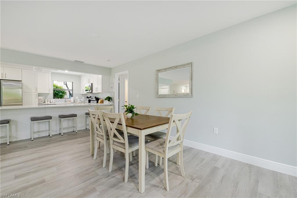 Dining room featuring baseboards and light wood-style floors