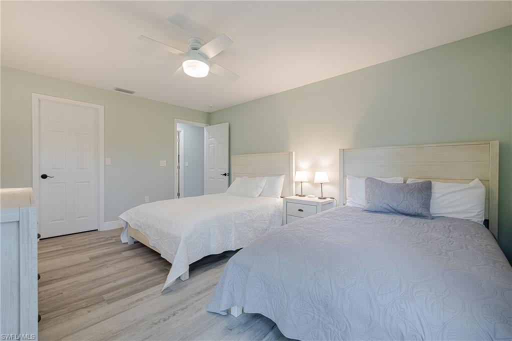 Bedroom featuring light wood-style floors and ceiling fan