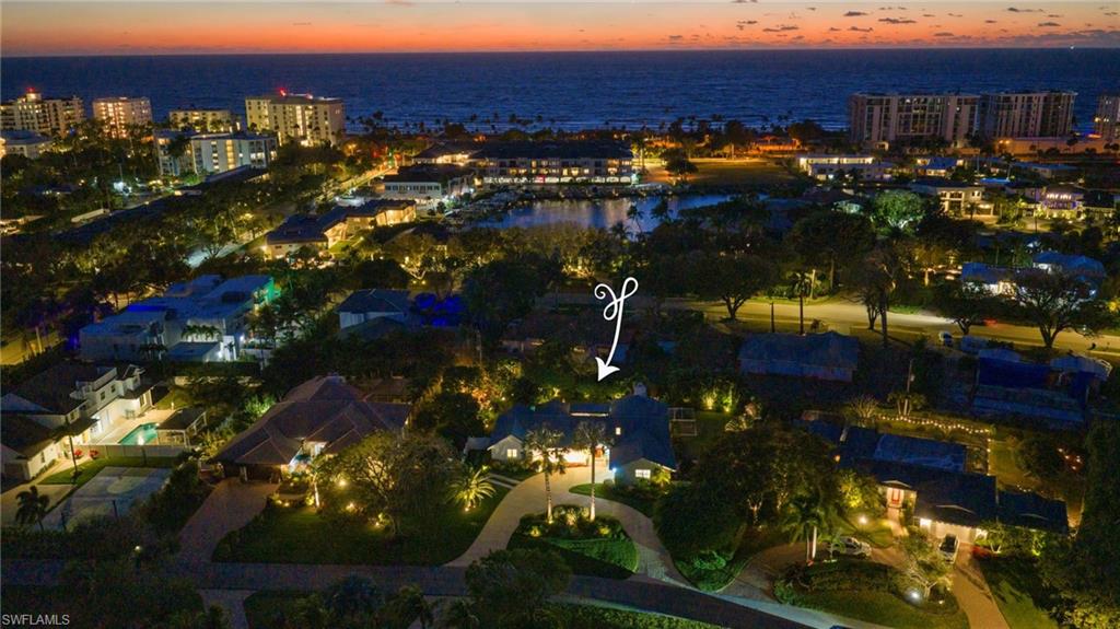 West exposure on .41 acres in the center of Naples
