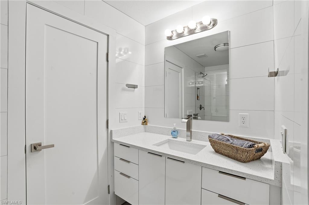 Bathroom with a shower and vanity