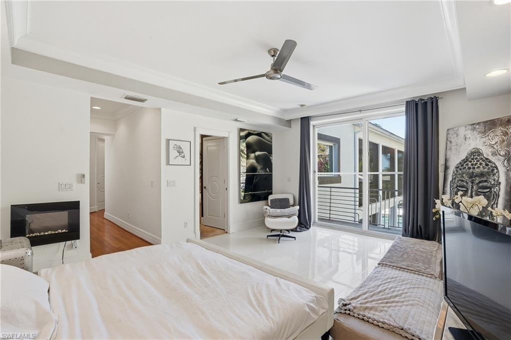 Bedroom with crown molding, a ceiling fan, access to outside, and recessed lighting