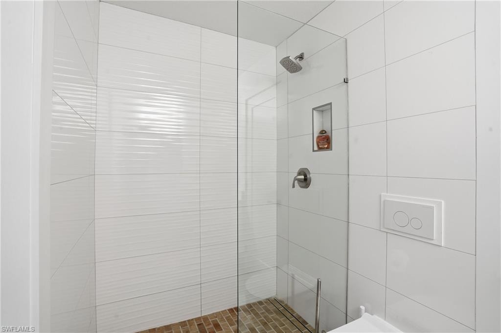 Full bath featuring a stall shower