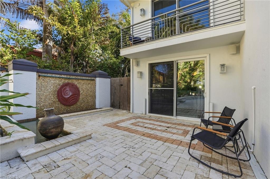 Patio / terrace featuring a patio and a gate