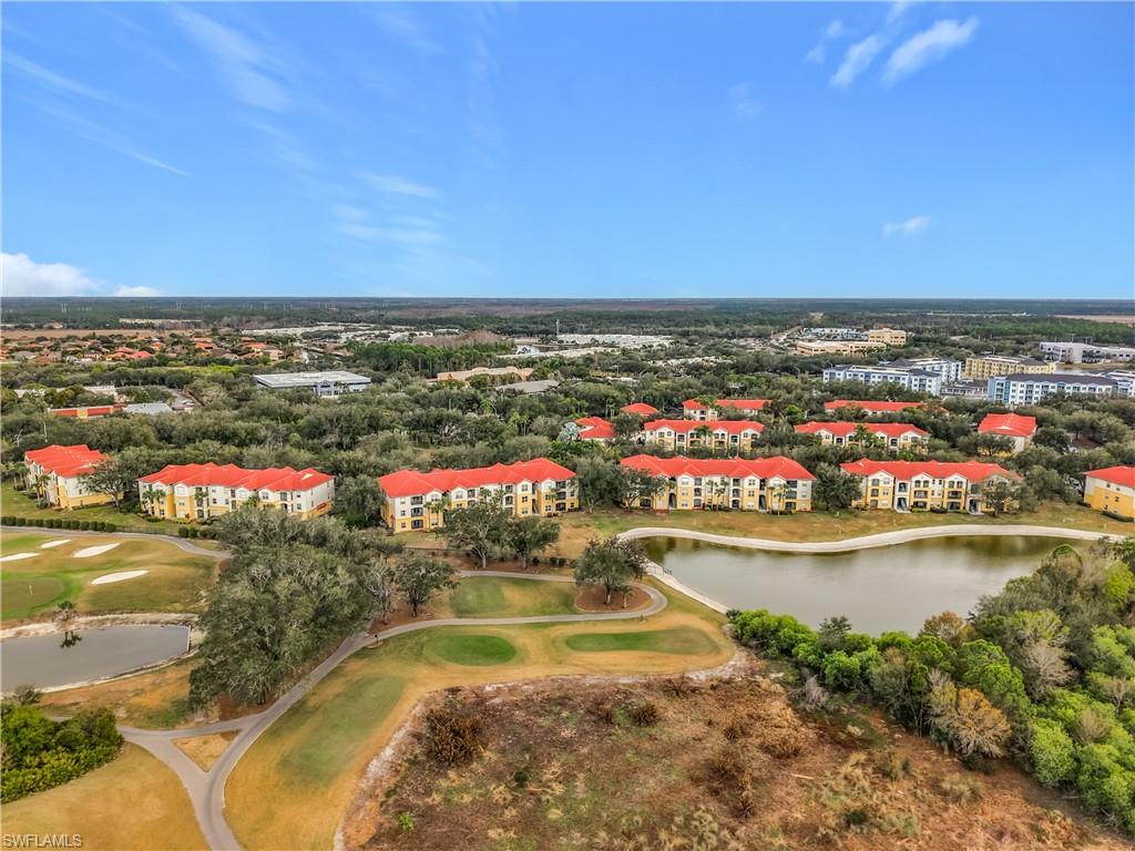 Aerial view of a local golf course and a nearby body of water