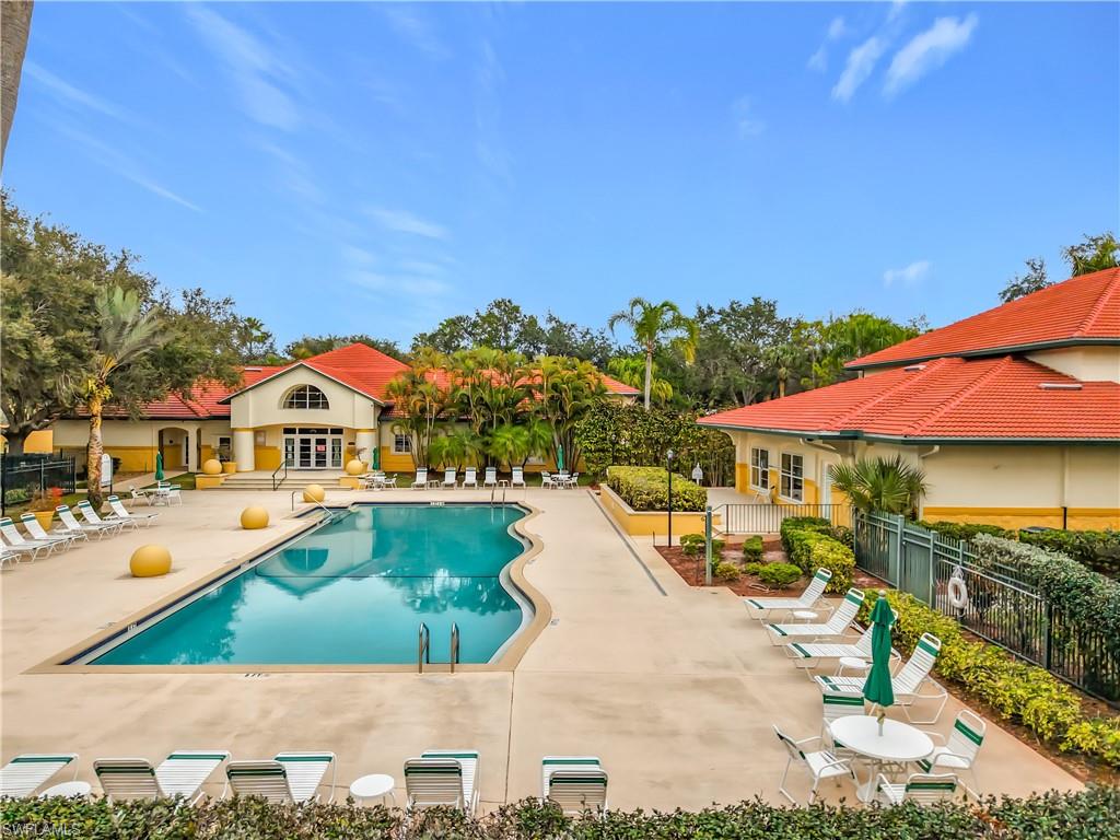Community pool with a patio area