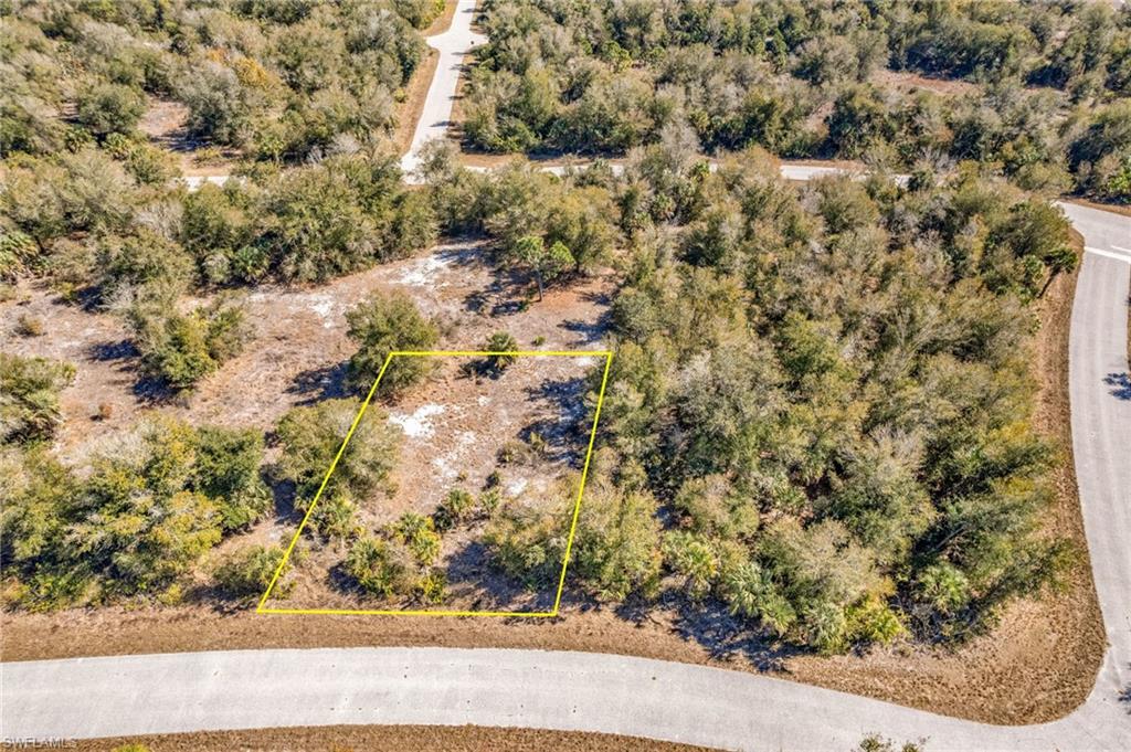 Aerial view of property's location featuring property parcel outlined