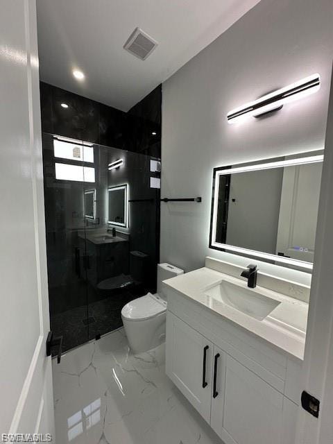 Full bath with a shower stall, vanity, and light marble finish floors