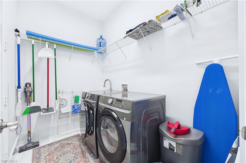 Laundry area featuring washing machine and dryer