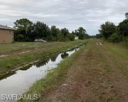 Canal/swale with water view