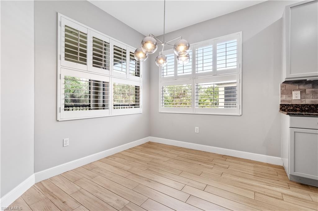Photo includes reality renovation/ staging to showcase the possibility of the dining room. Design services included with purchase!