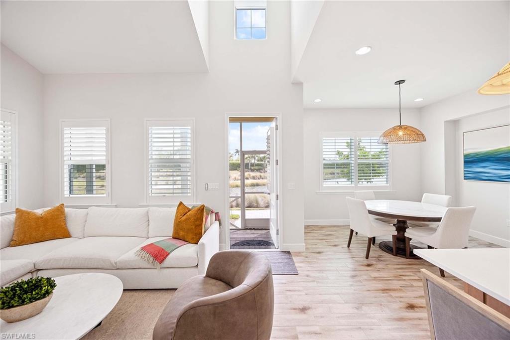 Living space with volume ceilings.