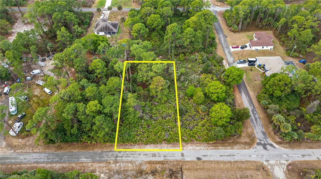 Aerial overview of property's location with property parcel outlined