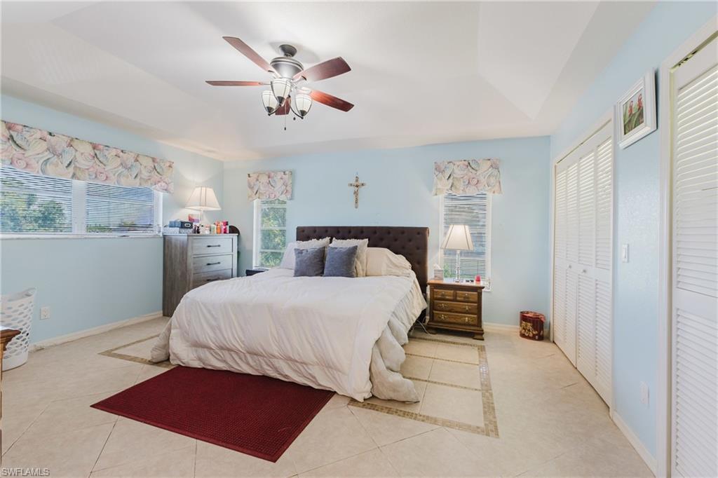 Dining room with vaulted ceiling and a chandelier