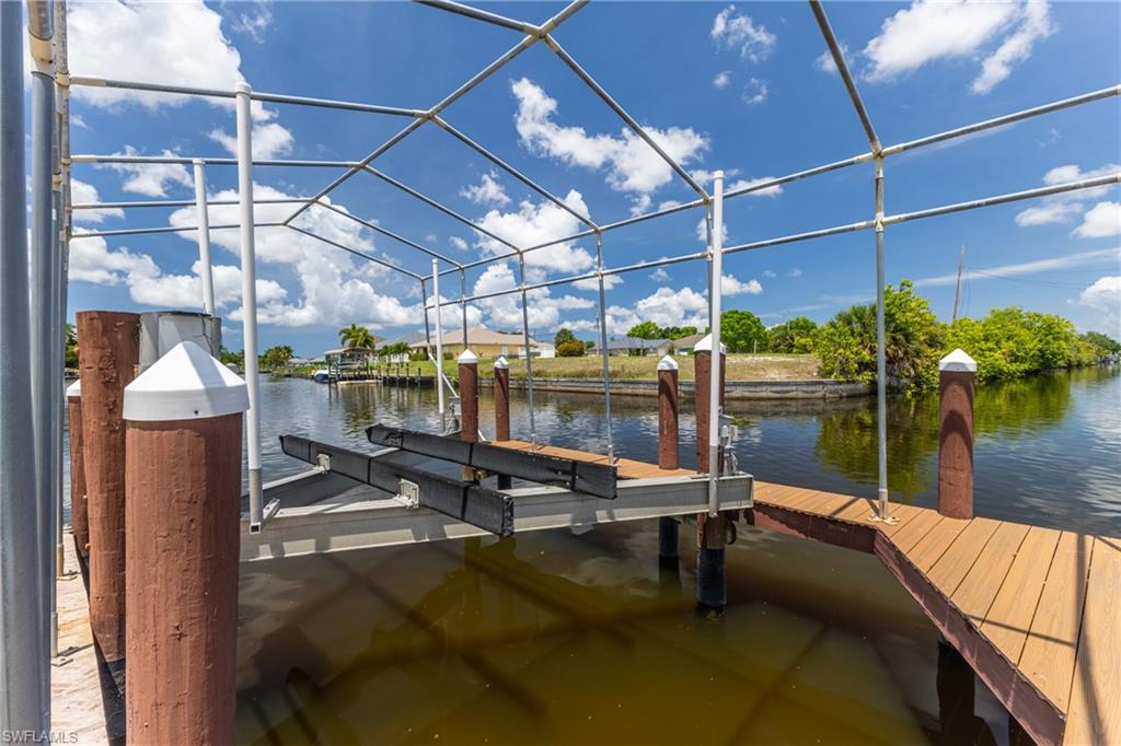 Dock featuring a water view