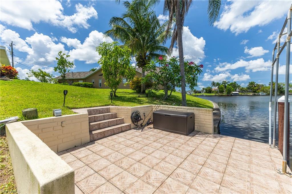 View of patio / terrace with a water view