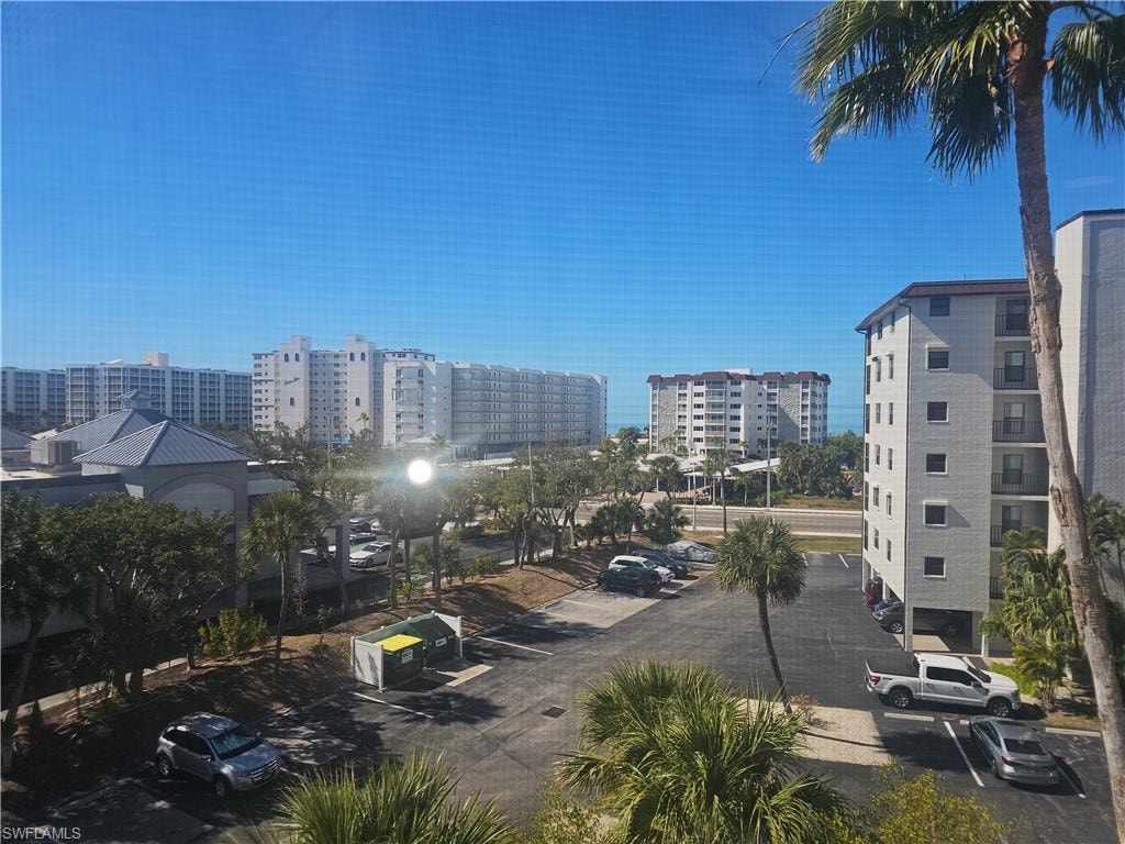 View from front balcony towards Estero Blvd, beach, gulf and surrounding properties