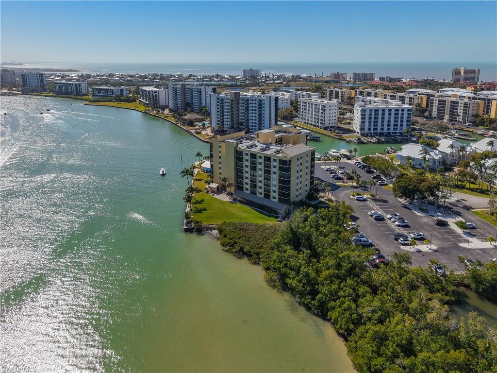 View of urban area featuring a nearby body of water