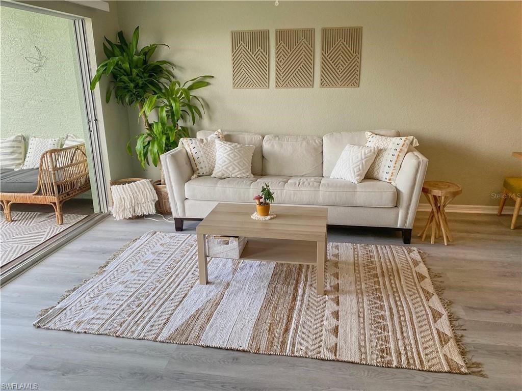 Living room featuring wood finished floors