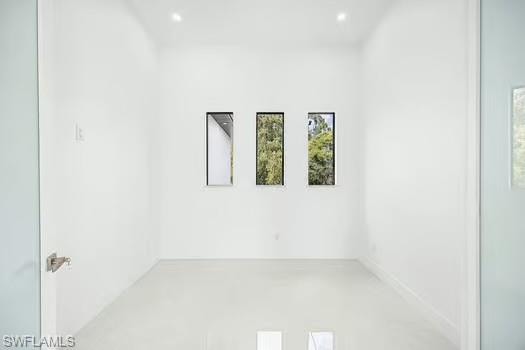 Unfurnished room with recessed lighting