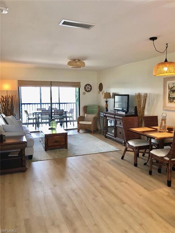 Living area featuring light wood-style floors