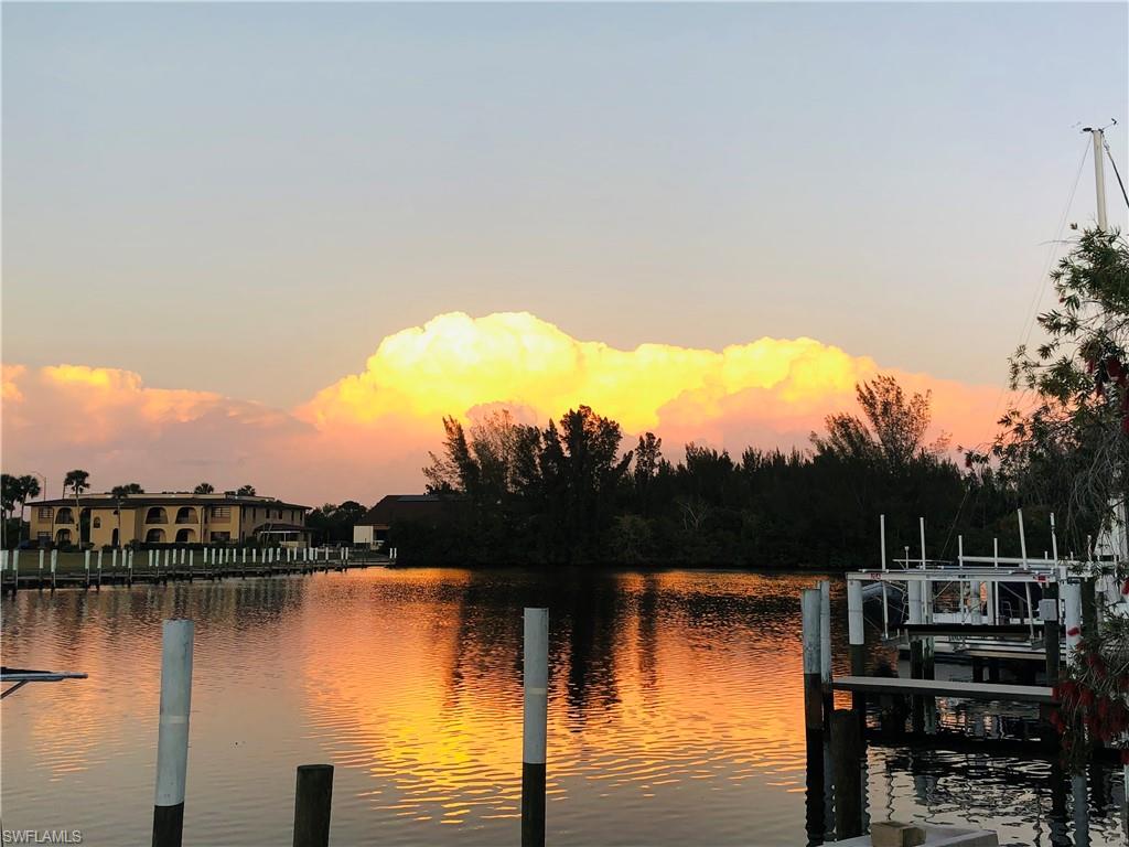 Water view with a boat dock