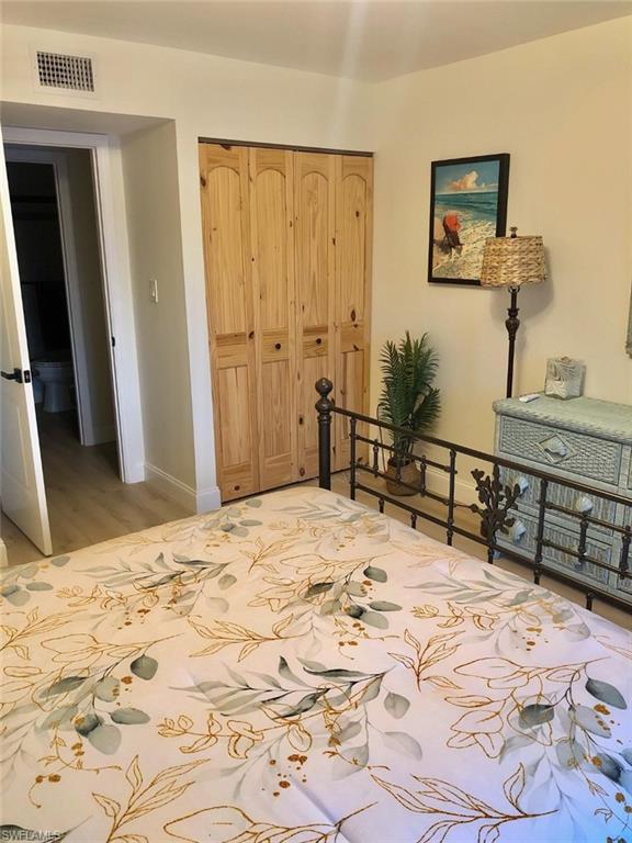 Bedroom featuring a closet and baseboards