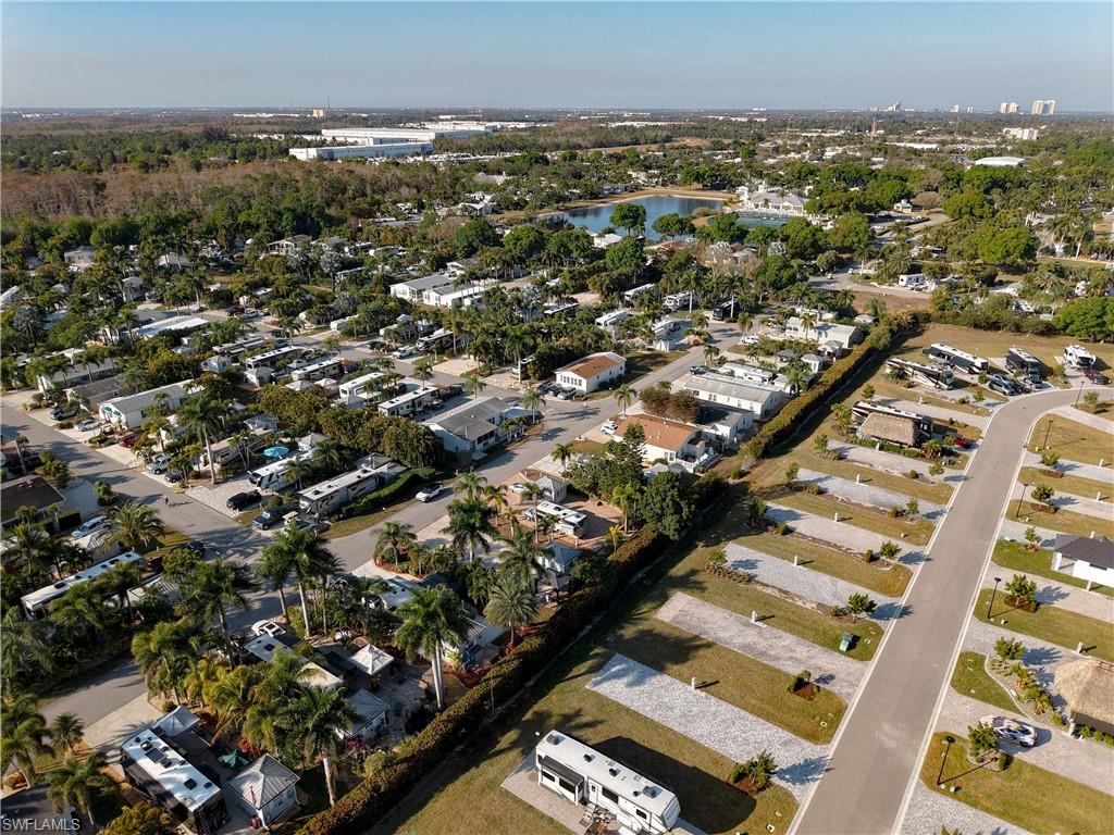 Aerial overview of property's location featuring nearby suburban area and a nearby body of water