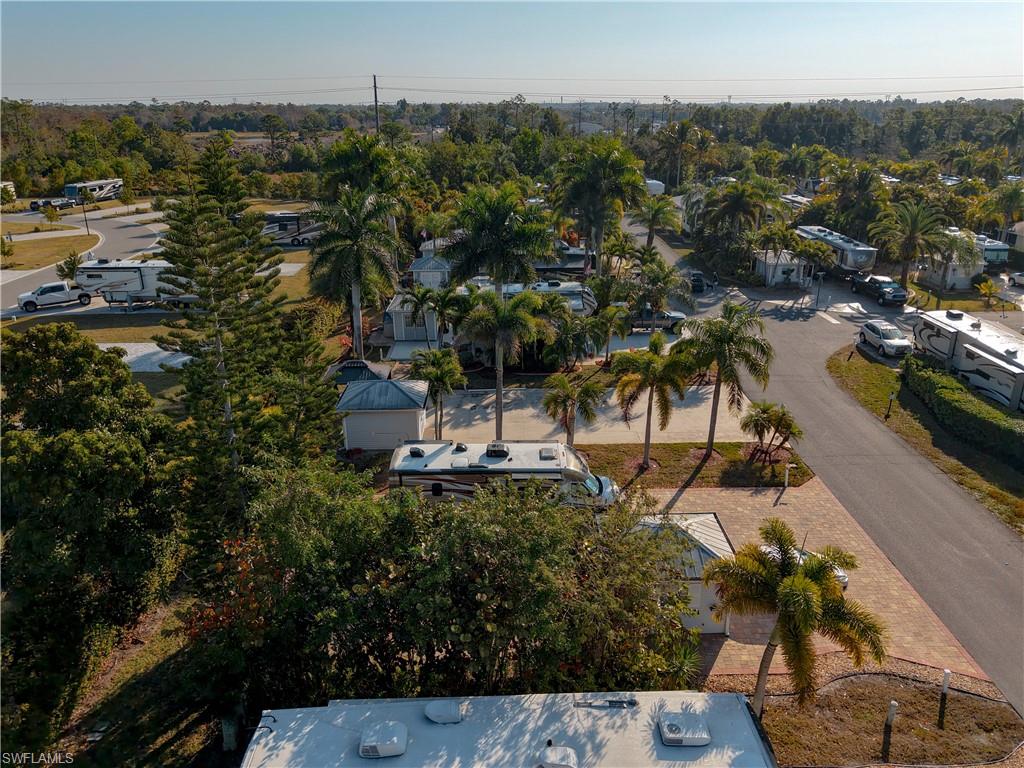 View of property location with nearby suburban area