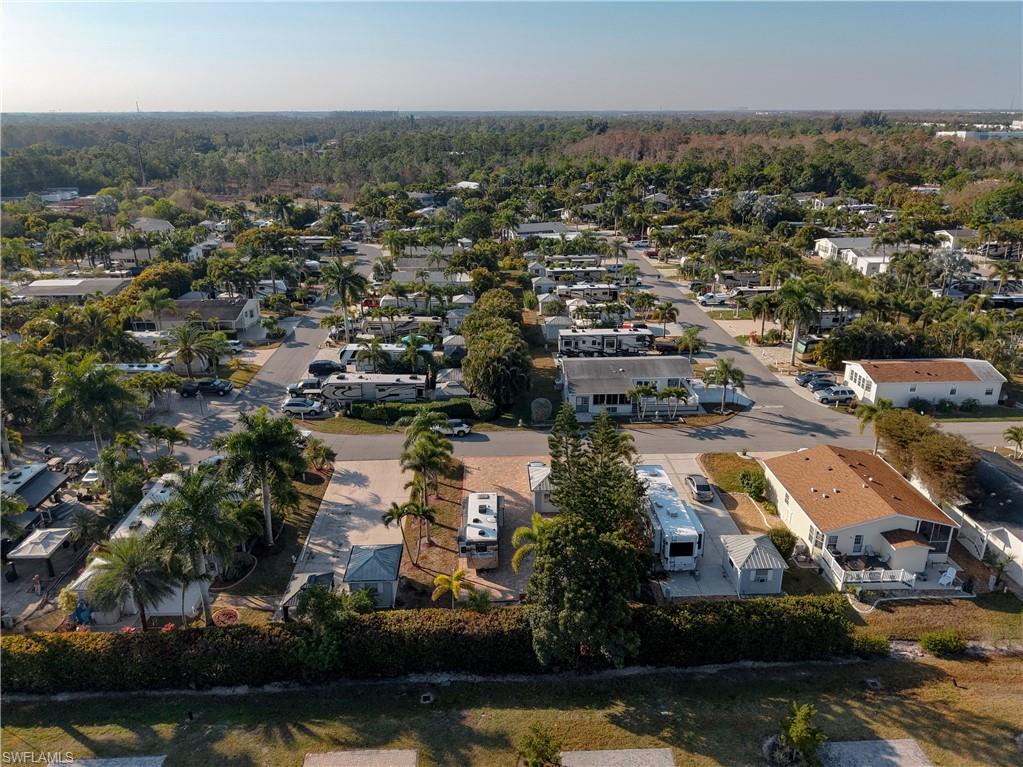 View of property location with nearby suburban area