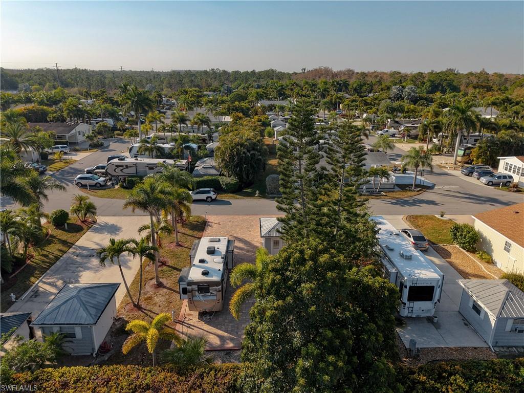 Aerial view of residential area with a tree filled landscape