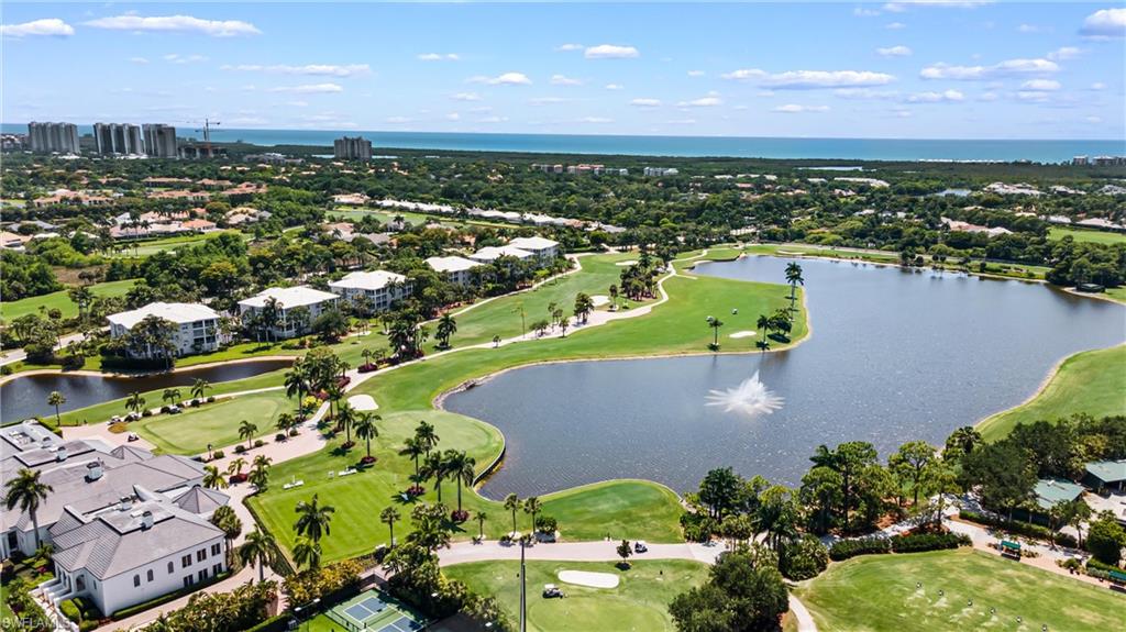 Aerial view of a large body of water and a golf course