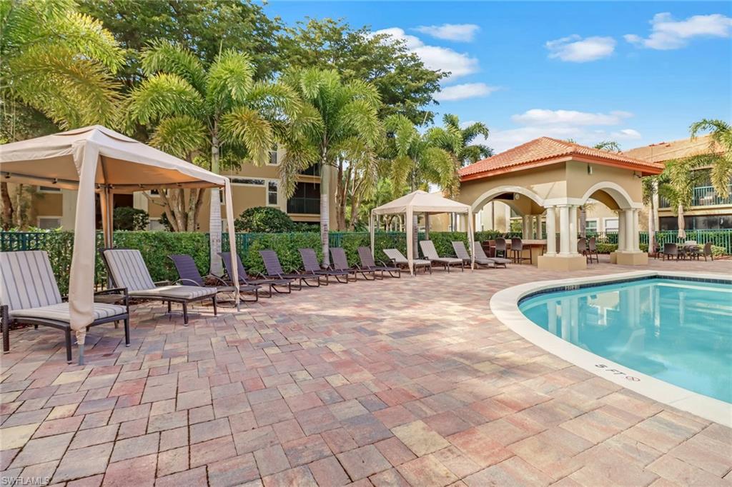 Community pool featuring a gazebo and a patio area