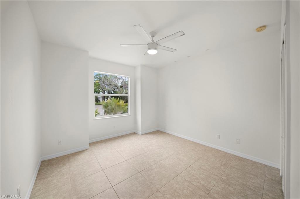 Neutral-toned tile flooring throughout