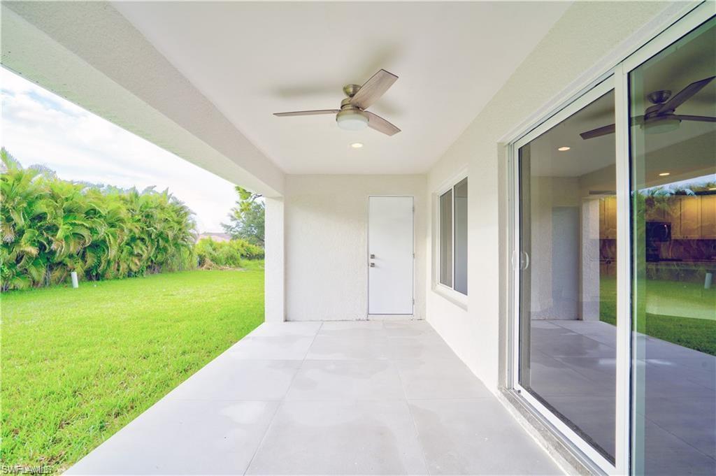 View of patio with a ceiling fan