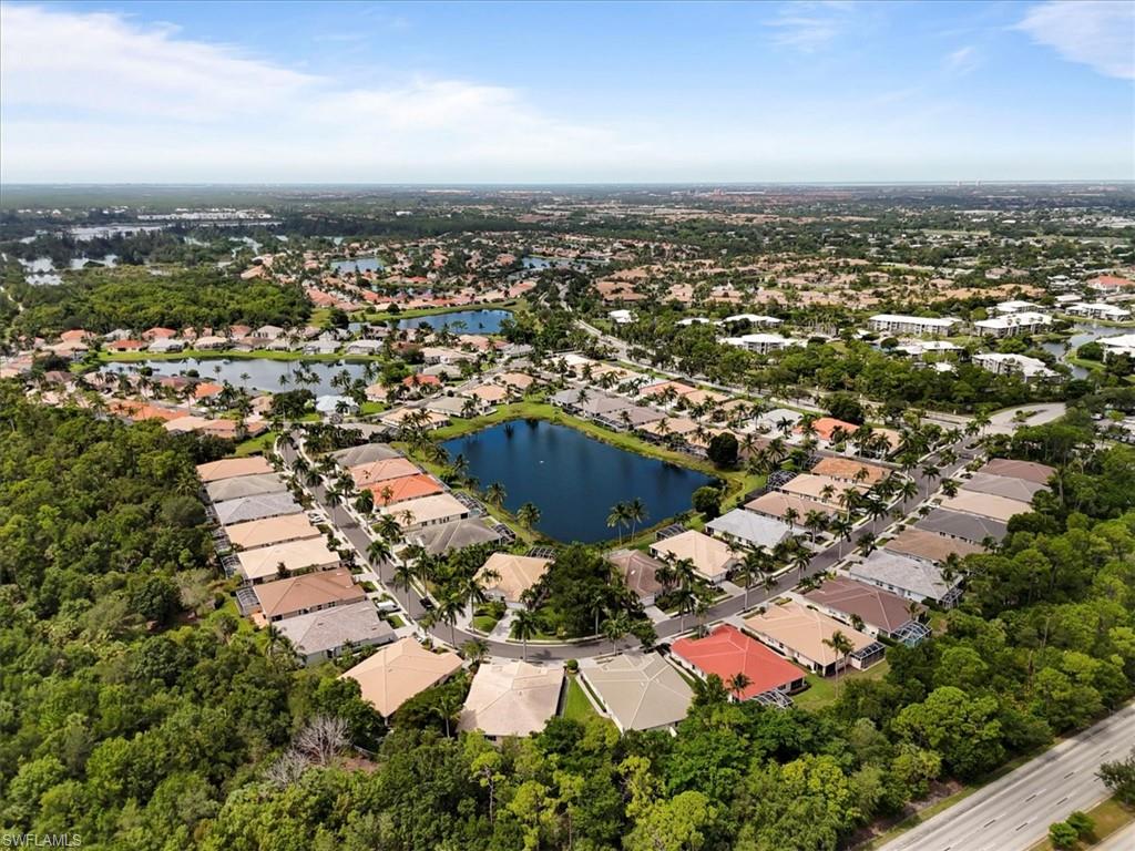 View of property location with nearby suburban area and a large body of water