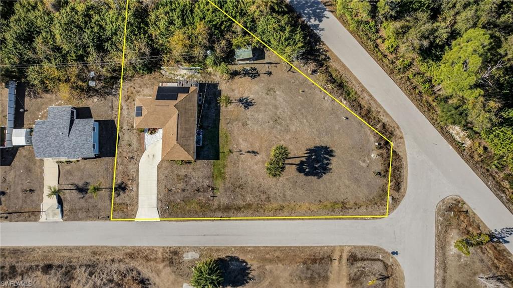 Aerial overview of property's location with property parcel outlined