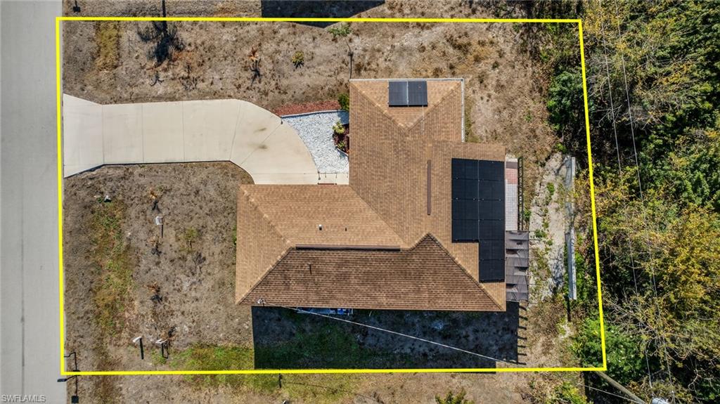 View from above of property featuring property parcel outlined
