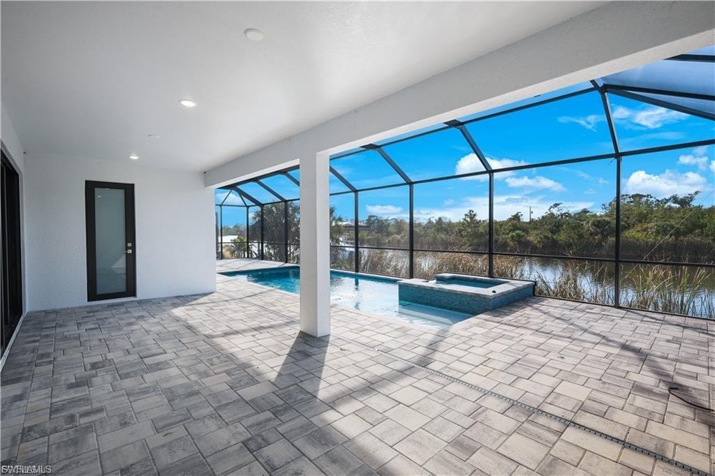 Lanai with view of pool-spa and canal in finished home