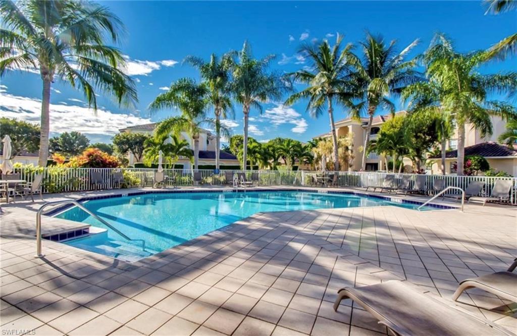 Community pool with a patio area