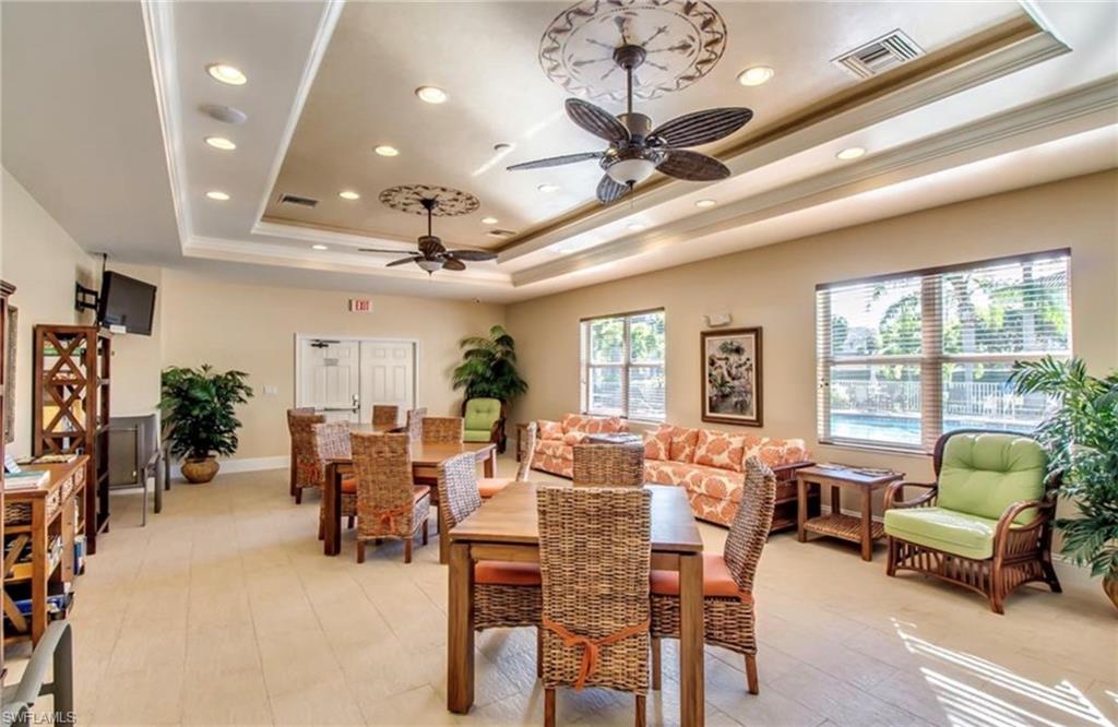 Dining space featuring recessed lighting, light wood-type flooring, a ceiling fan, and crown molding