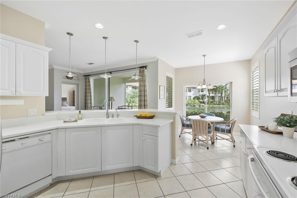 Even the breakfast nook has sparkling lake views with sliders to lanai and two windows for light and air.
