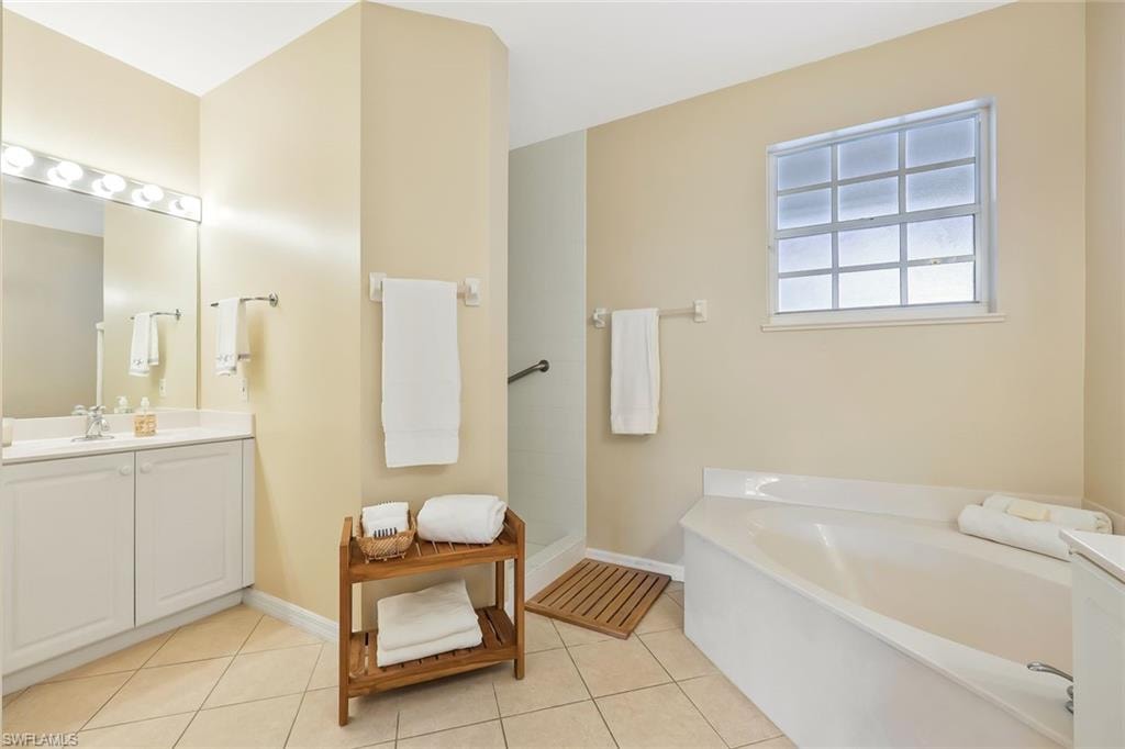 Two separate vanity areas. Private water closet.