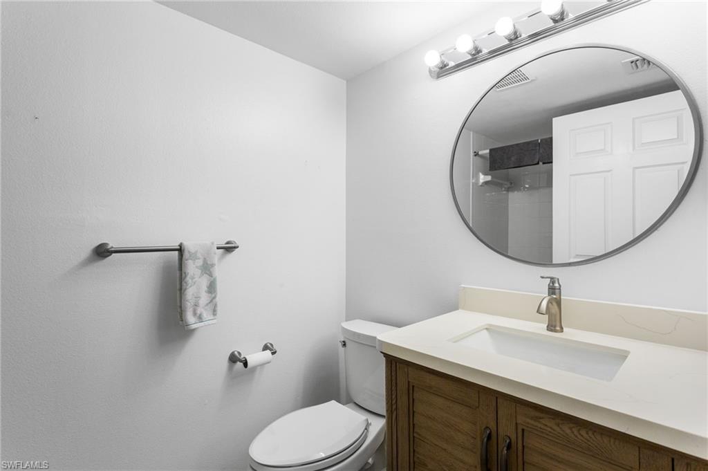 Full bathroom featuring vanity and a shower
