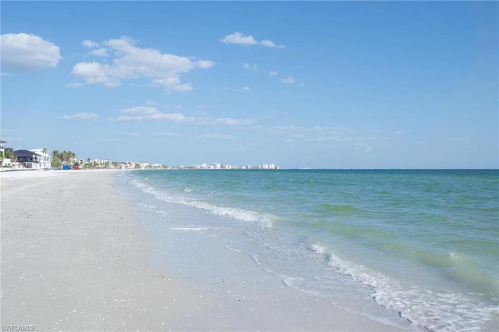 Water view featuring nearby beach - Virtually Edited Image